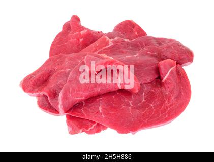 Group of fresh raw thinly sliced beef sandwich steaks isolated on a white background Stock Photo