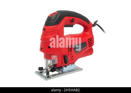 A jigsaw power tool isolated on white background. Electric jig saw. Professional electric jig saw isolated on white background. Electric fretsaw on a Stock Photo