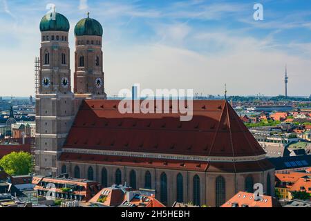 22 May 2019 Munich, Germany - Frauenkirche, gothic church with iconic domed towers. View from Peterskirche tower, panorama of Munich Stock Photo