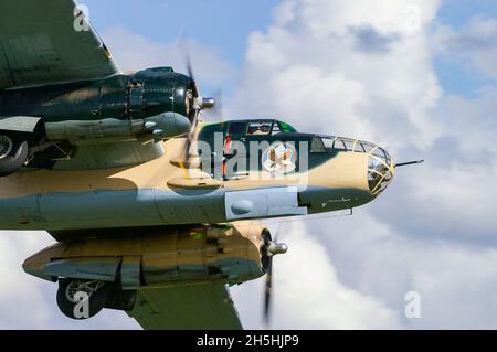 Old WWII Bomber Plane North American B-25 J Mitchell Flying During An ...