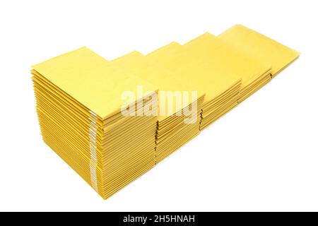 Stairs made of five stacks of padded envelopes isolated on white background Stock Photo