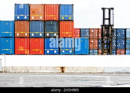 Stack of shipping containers in the harbour of Vigo Stock Photo
