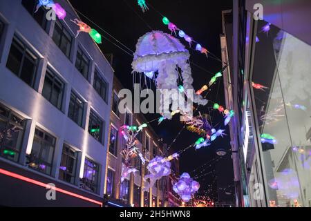 LONDON, UK - DECEMBER, 01 2019: Christmas street decorations at Seven Dials in Covent Garden area attract thousands of people during the festive seaso Stock Photo