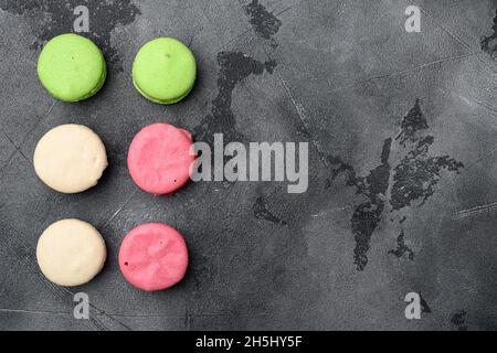 Colorful french macarons set, on gray stone table background, top view flat lay, with copy space for text Stock Photo