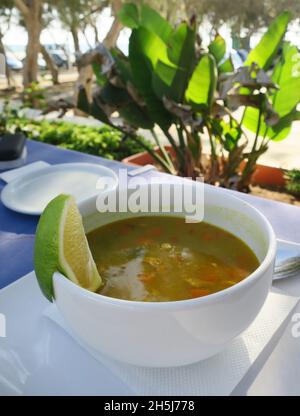 Vegetable soup for lunch on the street veranda of a restaurant in Ayia Napa, Cyprus Stock Photo