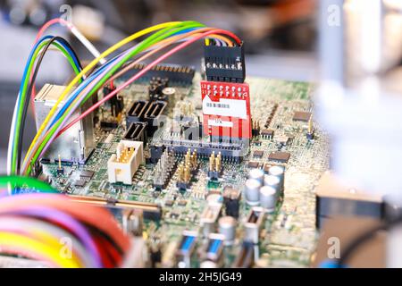 Electronic circuit board chips processor. Green PCB Component. Stock Photo