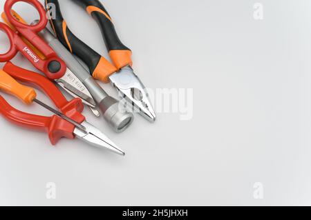 COMO, ITALY - Nov 09, 2021: tools and utensils on a white background with copy space Stock Photo