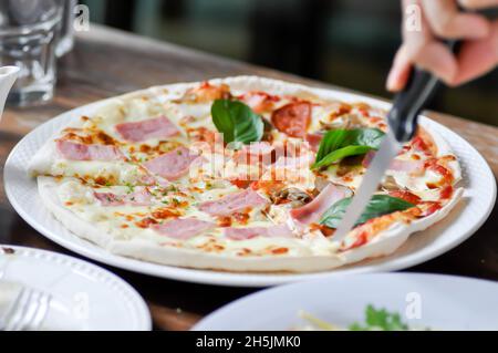 pizza or pepperoni pizza and ham and cheese pizza or half pizza Stock Photo