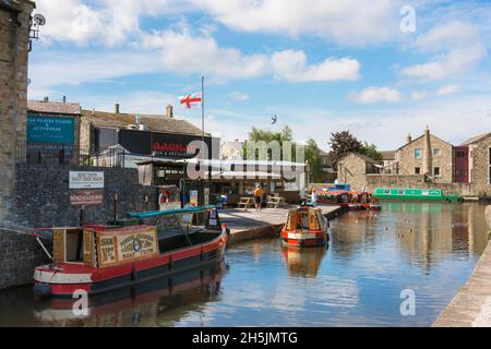 Skipton Yorkshire, view in summer of tourist narrow boats moored on the Leeds And Liverpool Canal in the centre of Skipton, Yorkshire, England, UK Stock Photo