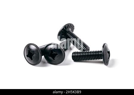 Black steel screws close up isolated on white Stock Photo