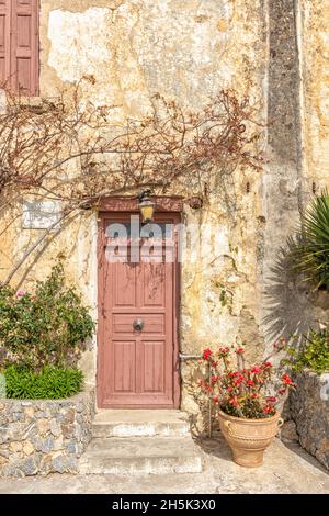 Old wooden brown door in Rethymnon. Greece. Stock Photo