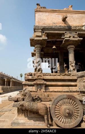 Horse-drawn chariot carved in stone in Dravidian Chola era Airavatesvara Temple, Darasuram, Tamil Nadu, India; Darasuram, Tamil Nadu, India Stock Photo