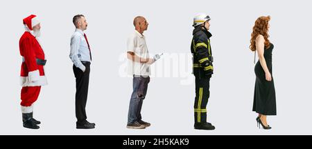 Collage of different people standing in a line isolated on white background. Santa, businessman, painter, firefighter, singer Stock Photo