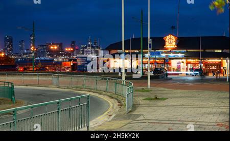 Woodside Ferry Village, Birkenhead, still the actual Ferry terminal as well as a modern food outlet, with the Liverpool skyline in the distance. Stock Photo