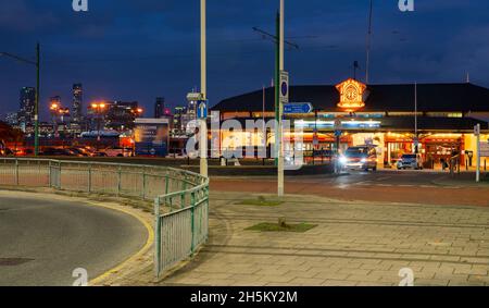 Woodside Ferry Village, Birkenhead, still the actual Ferry terminal as well as a modern food outlet, with the Liverpool skyline in the distance. Stock Photo