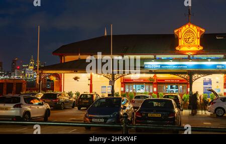 Woodside Ferry Village, Birkenhead, still the actual Ferry terminal as well as a modern food outlet, with the Liverpool skyline in the distance. Stock Photo