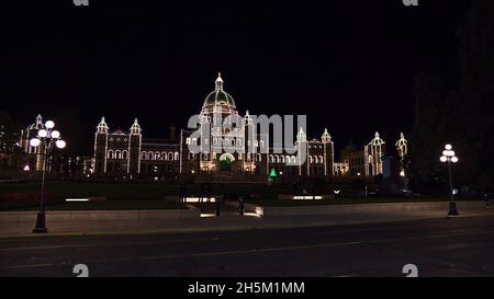 Beautiful night view of illuminated British Columbia Parliament Building in Victoria downtown, Canada on Vancouver Island with street lights. Stock Photo