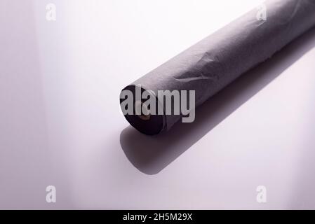 roll of black carbon paper tape on white background Stock Photo
