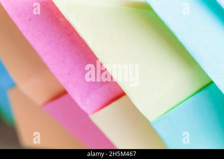 Colorful origami, background photo with selective soft focus, abstract parametric pattern made of paper sheets Stock Photo