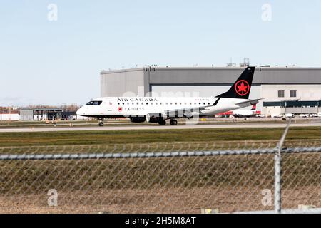 Air Canada Express Embraer E175SU in Montreal Airport, Pierre-Elliott Trudeau, Quebec, Canada Stock Photo