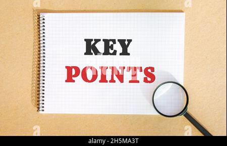 Notebook with words Key points and a magnifying glass. Business management concept, strategy, goals Stock Photo