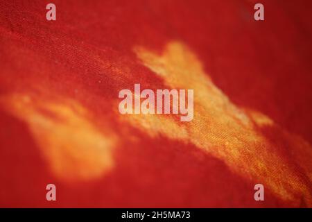 Red and yellow textile psychedelic design close up background high quality big size print Stock Photo