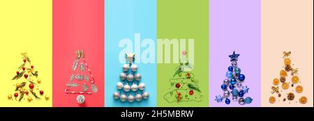 Beautiful Christmas trees made of decorations on color background Stock Photo