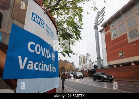 London, UK, 10 November 2021: at a vaccination centre next to Kennington Oval cricket ground a steady stream of people attend to get their booster jabs or first jabs of Pfizer coronavirus vaccine. Anna Watson/Alamy Live News Stock Photo
