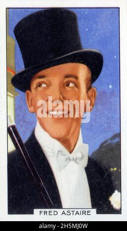 Collectible vintage trading card from a set titled Portraits of Famous Stars  featuring Fred Astaire was issued by Gallaher Ltd. of the UK. Stock Photo