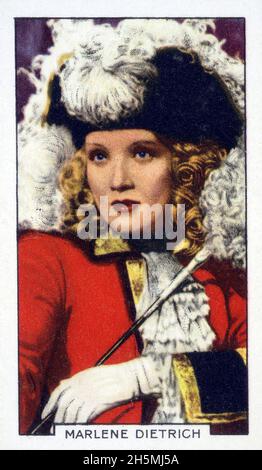 Collectible vintage trading card from a set titled Portraits of Famous Stars  featuring Marlene Dietrich was issued by Gallaher Ltd. of the UK. Stock Photo