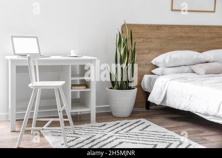 Interior of light modern stylish bedroom Stock Photo