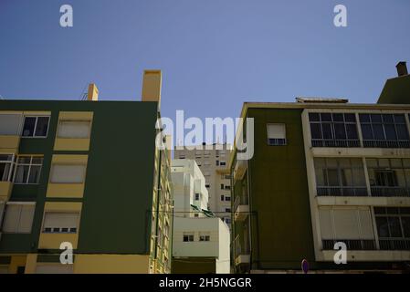 LISBOA, PORTUGAL - Jul 13, 2021: A low angle view of residential buildings under a blue sky i Lisbon, Portugal Stock Photo