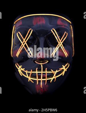 Light Up LED Face Mask Isolated Against Black Background Stock Photo