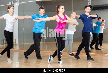 People practicing vigorous dance Stock Photo