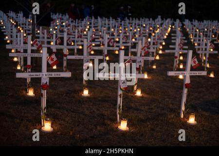 Night of Lights at the Field of Crosses memorial for fallen soldiers with candles burning from sunset on Nov 10 to sunrise on Remembrance Day Stock Photo