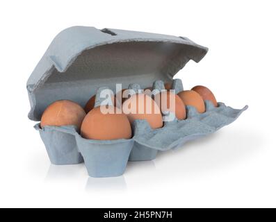 Ten brown eggs on cardboard box isolated on white background Stock Photo
