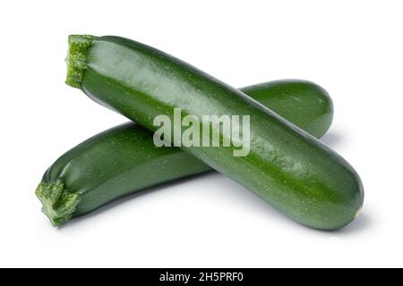 Pair of fresh green whole zucchini isolated on white background Stock Photo