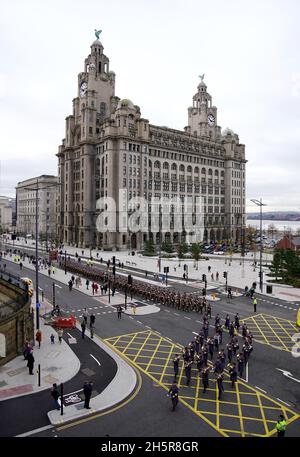 A military band lead the 1st Battalion of The Duke Of Lancaster's Regiment as they march through the streets of Liverpool to Our Lady & Saint Nicholas Church before observing a two minute silence to remember the war dead on Armistice Day. Picture date: Thursday November 11, 2021. Stock Photo