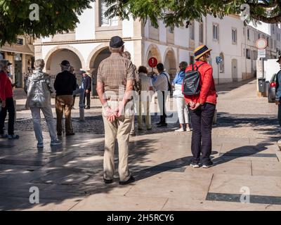 Lagos, Algarve, Portugal - November 5 2021: Tourists outside Mercado De Escravos during guided tour - The Slave Market Museum. Stock Photo