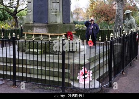 Syston, Leicestershire, UK. 11th November 2021. A life size knitted soldier during Armistice Day commemorations at the Syston War Memorial. Credit Darren Staples/Alamy Live News. Stock Photo