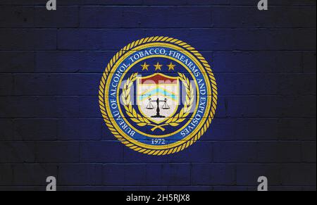 The ATF (Bureau of Alcohol, Tobacco, Firearms and explosives) painted on a brick wall. Stock Photo