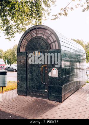 Unisex public toilet in Riga Stock Photo