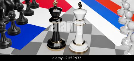 France and Russia - talks, debate, dialog or a confrontation between those two countries shown as two chess kings with flags that symbolize art of mee Stock Photo