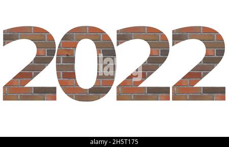 2022 text for the new year, text with numbers made from wall of bricks isolated on a white background Stock Photo