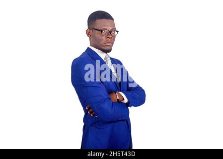 serious young businessman wearing elegant suit with glasses and looking at camera Stock Photo