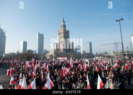 Warsaw, Warsaw, Poland. 11th Nov, 2021. People gather during the Poland's Independence Day March on November 11, 2021 in Warsaw, Poland. Several thousands of people took part in the annual far-right organised Poland's Independence March under the slogan ''Independence not for sale'' as a State event backed by the government. Previously, decisions by courts and the municipal authorities had prevented it from taking place legally. (Credit Image: © Aleksander Kalka/ZUMA Press Wire) Stock Photo