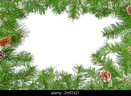 Christmas Fir Branches onwhite Paper, with Fir Cones  isolated on white Background Stock Photo