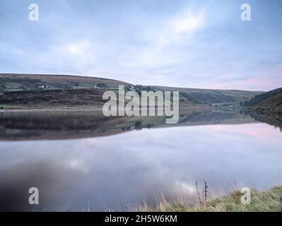 Butterley Reservoir in the Wessenden Valley near Marsden at dawn. Stock Photo