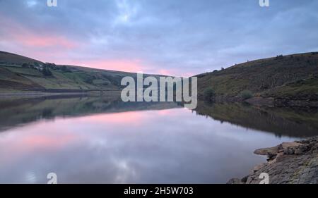 Butterley Reservoir in the Wessenden Valley near Marsden at dawn. Stock Photo