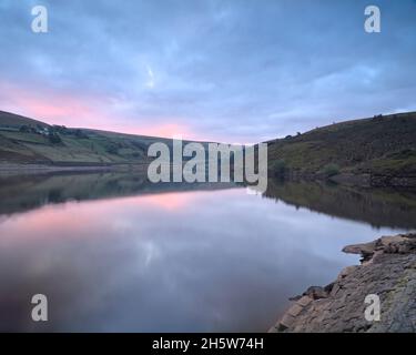 Butterley Reservoir in the Wessenden Valley near Marsden at dawn. Stock Photo